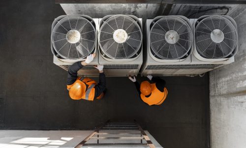 men-working-with-equipment-full-shot