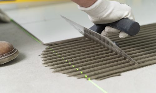 tiler-working-renovation-apartment (1)