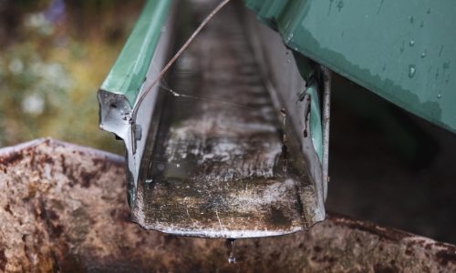 vertical-closeup-roof-drain-pipe